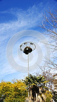 Stork nest in a lighting tower of the Sant MartÃ­ de ProvenÃ§als park in Barcelona