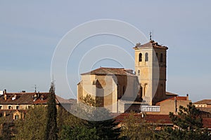 Storks nests on the top of an old bell tower in Segovia, Spain