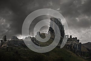 Storm above castle ruins