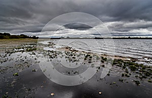 A storm brewing over a lake in Staffordshire, England