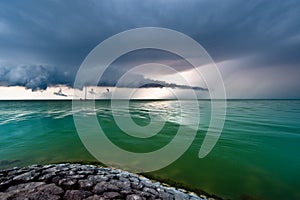A storm cloud approaching on the IJsselmeer photo