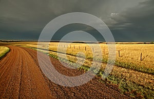 Storm clouds along a Saskatchewan road