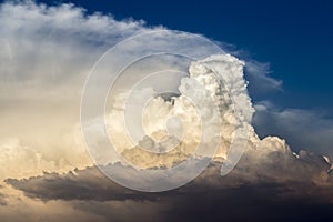 Storm clouds bathed in sunset light