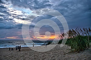 Storm clouds at beach sunrise