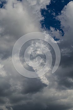 Storm clouds in a blue sky