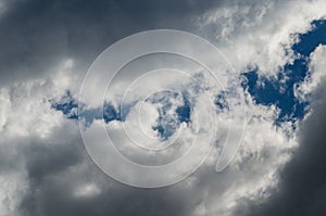 Storm clouds in a blue sky