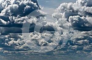 Storm clouds on blue sky