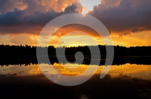 Storm Clouds Mix With Colorful Sunset photo