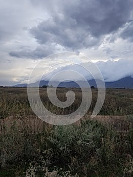 Storm Clouds Coming Down Mountain