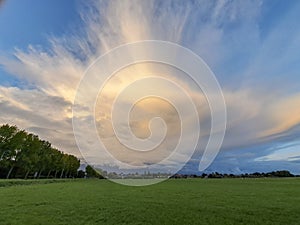 Storm clouds or cumulonimbus over the meadows of Hazerswoude