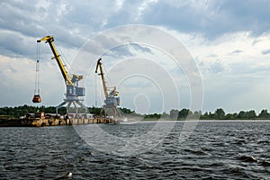 storm clouds forming over Riga cargo shipping port on river Daugava