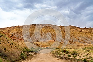 Storm clouds and gravel road in southern Utah