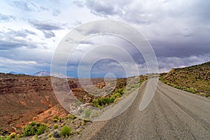 Storm clouds and gravel road in southern Utah