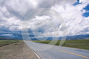 Storm clouds and highway