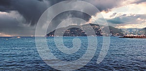 Storm clouds and island, storm Passing over the ocean, dramatic clouds