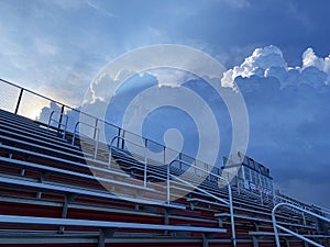 Storm clouds moving in over stadium bleachers