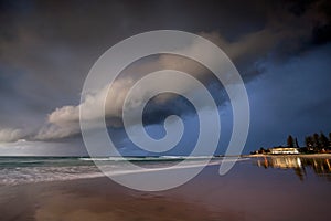 Storm clouds over beach, Rainbow Bay, Gold Coast Australia