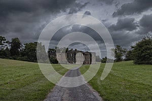 Storm clouds over Calke Abbey in Derbyshire