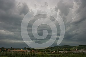 Storm clouds over the countryside in central Romania.