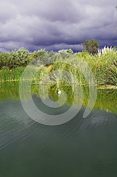 Storm clouds over lake