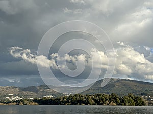 Storm clouds over the mountains and river Minho, Eiras, O Rosal, Galicia, Spain, December 2022 photo