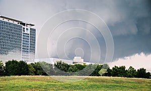 Storm clouds over office buildings