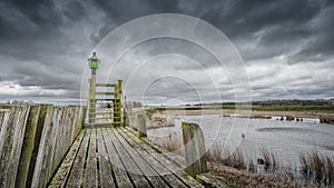 Storm clouds over the old port of schokland, Netherlands