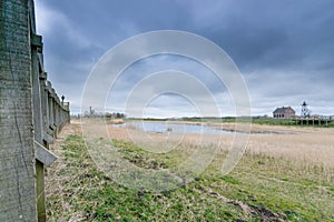 Storm clouds over the old port of schokland, Netherlands