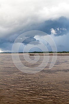 Storm clouds over river Napo photo