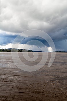 Storm clouds over river Napo photo
