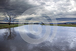 Storm clouds over the river in the spring