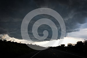 Storm clouds over the road.
