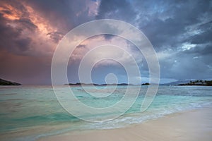 Storm clouds over a tropical beach