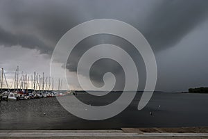 Storm clouds over the yacht harbor in the Salzhaff of Rerik at the Baltic Sea Mecklenburg-Vorpommern, Germany, copy space,