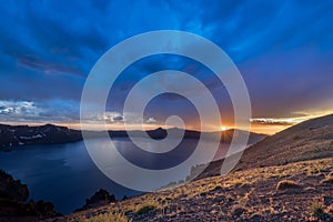 Storm Clouds Push in at Sunset Over Crater Lake