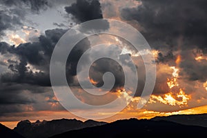 Storm Clouds at Sunset over the mountains