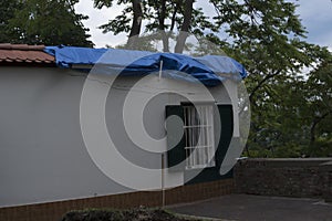 Storm damage, broken house roof