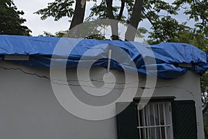 Storm damage, broken house roof