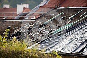 Storm damaged roof, destroyed roof tiles