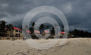 Storm on Flic en Flac Beach in Mauritius with dark sky