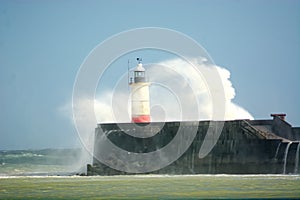 Storm Hannah batters Newhaven lighthouse. Sussex. UK