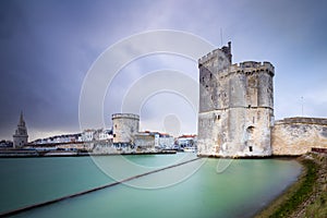 Storm over the entrance of the old harbor of La Rochelle in France