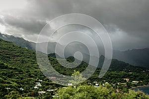 Storm over mountainside, Nuku Hiva, Marquesas Islands, French Polynesia photo
