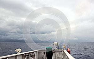 Before the storm. A painted view of storm and rain clouds and the sky above the sea horizon.