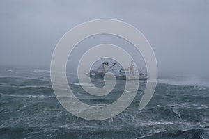 Storm,rain and a fishing boat.