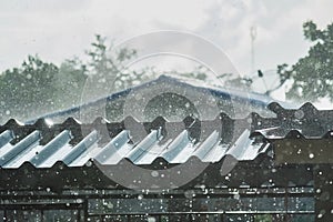 Storm rain on the roof of the house