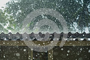 Storm rain on the roof of the house