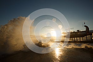 Storm at the sea and embankment street of Yalta city in Crimea in the morning on 24.10.2016. Big waves and tides wash