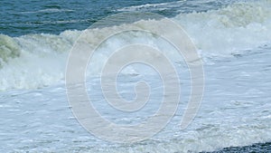 Storm At Sea. Wave With Texture And Wind Spray. Beautiful Dark Sea Surface In Day. Slow motion.