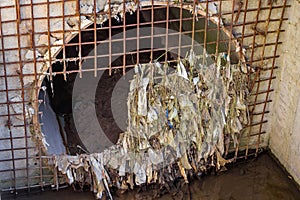 Storm sewer pipe closed with grating